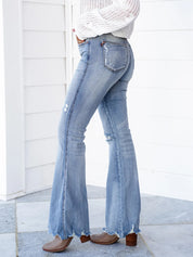 Date Night Mid Rise Medium Wash Tummy Control Distressed Flare Jeans