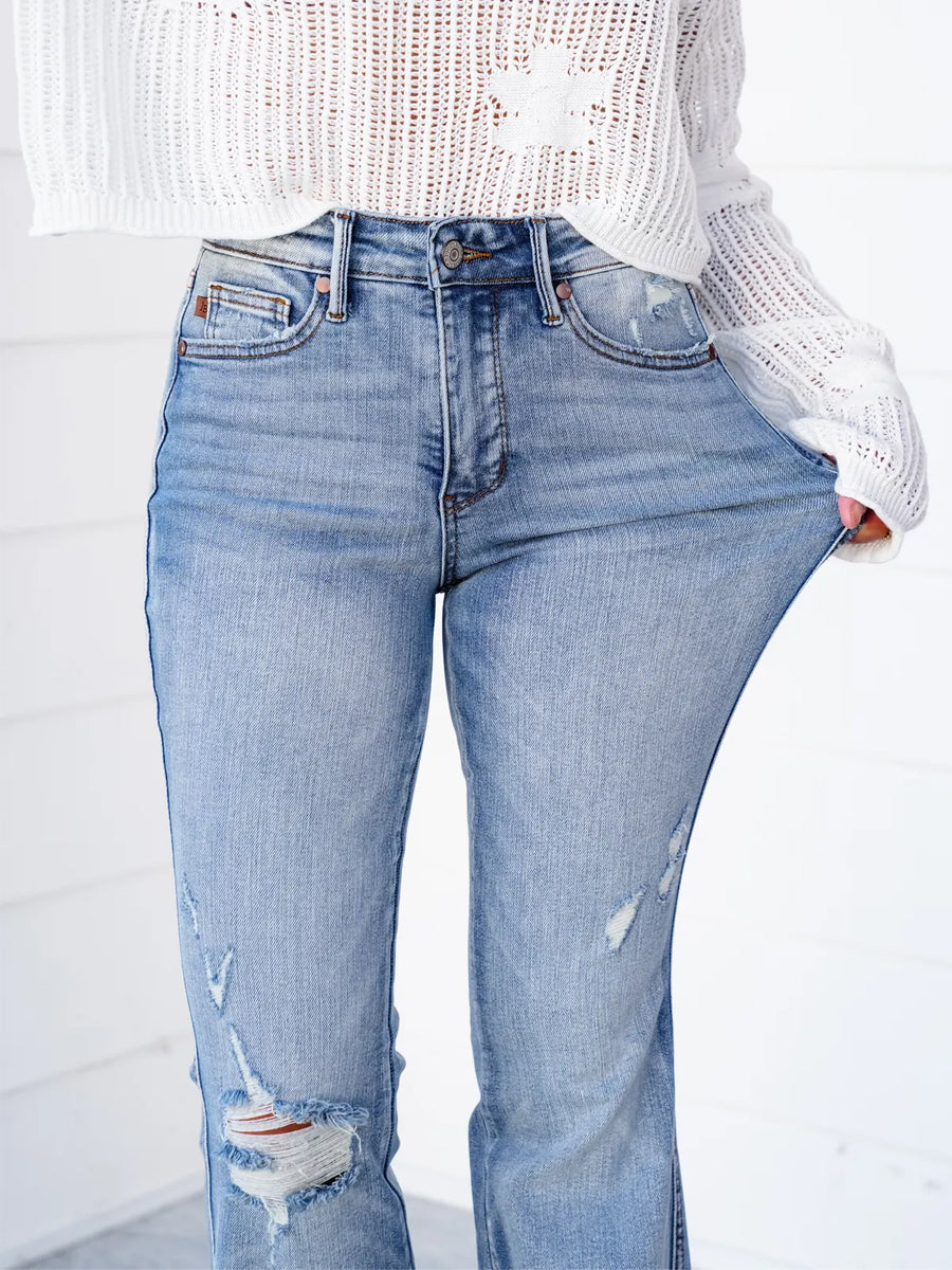 Date Night Mid Rise Medium Wash Tummy Control Distressed Flare Jeans