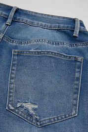 Wash Raw Hem Ripped Mid Rise Barrel Leg Jeans